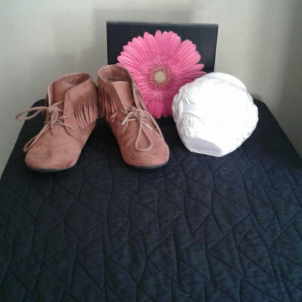 A pair of Midwest cowgirl boots  with ruffles